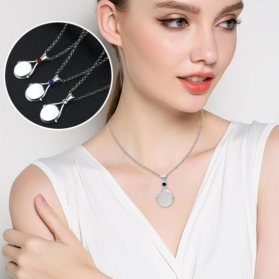 woman wearing a silver necklace with a pendant, inset showing three similar necklaces.