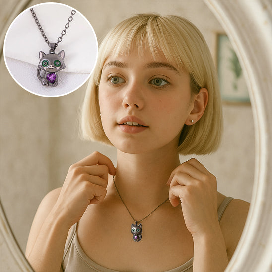 Woman wearing a necklace with a cat pendant, inset showing the pendant close-up.