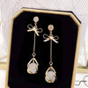 Bow tie cat's eye-gold
