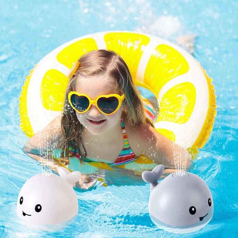 rechargeable light up whale bath toy 🐳 - nivoland